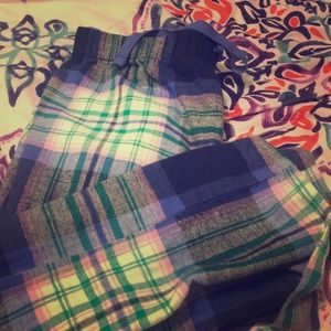 purple and green plaid pajama pants.